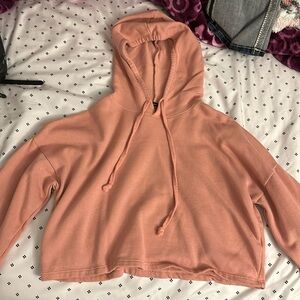 Medium, pink hoodie, brand ambiance